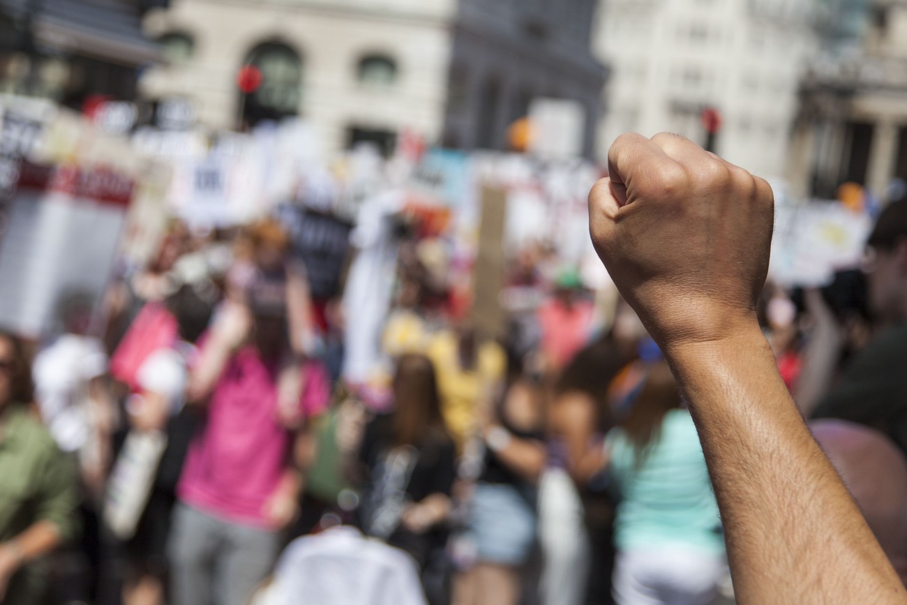 Close up of fist raised in the air