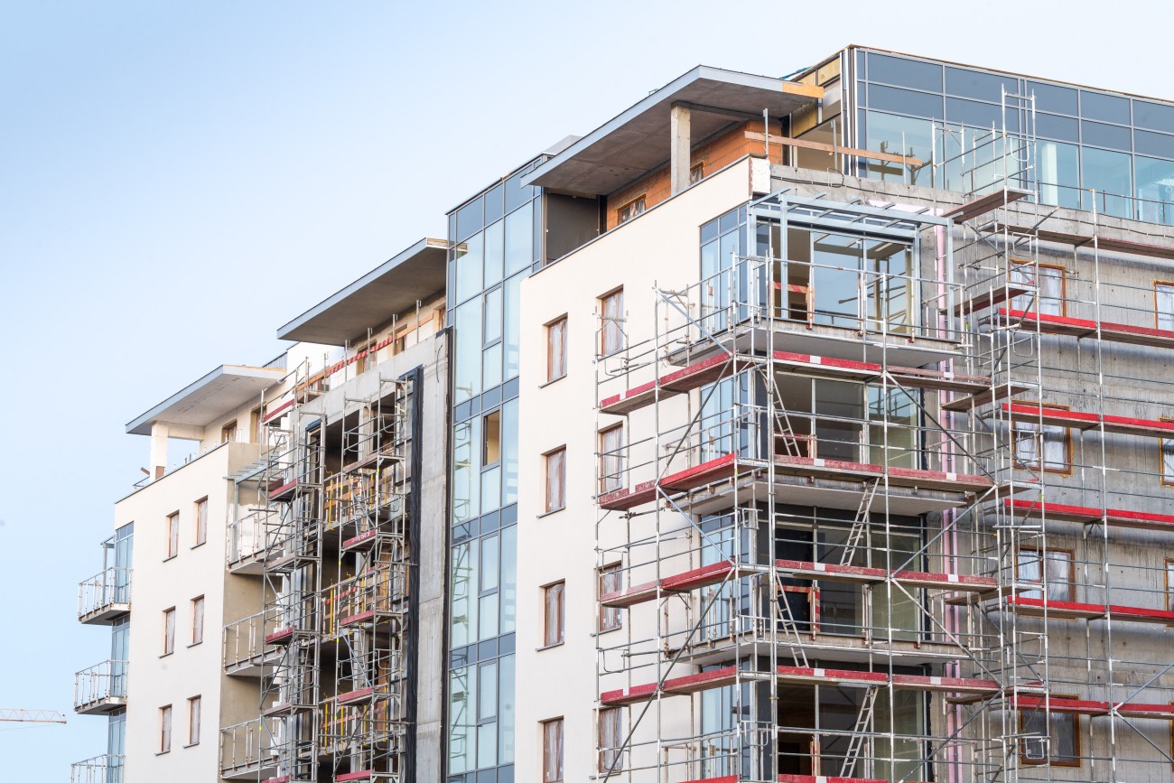 view of apartment building under construction
