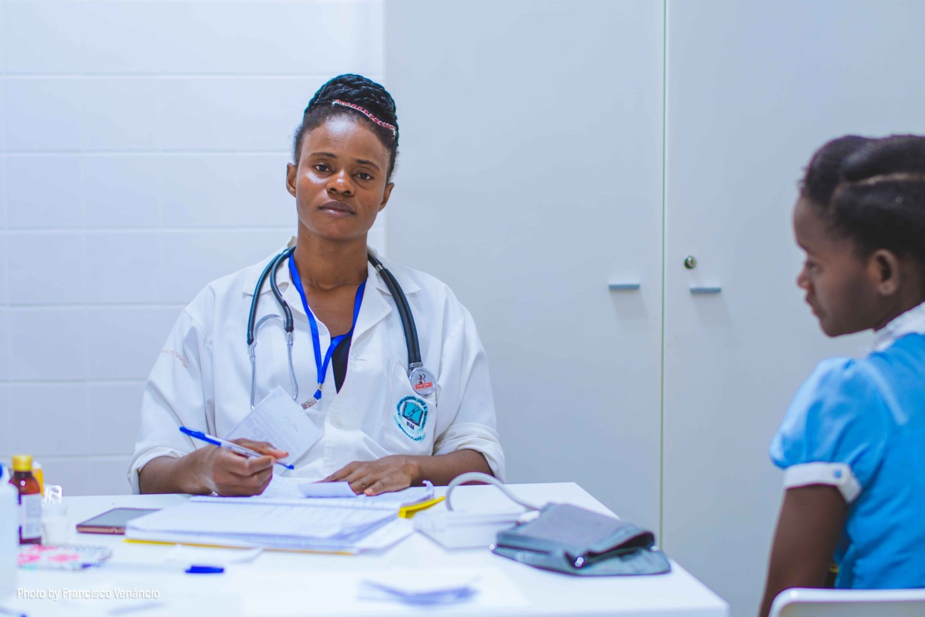 doctor recording patient information